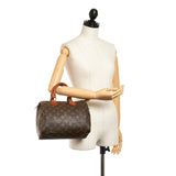 Louis Vuitton Monogram Speedy 25 (SHG-26877)